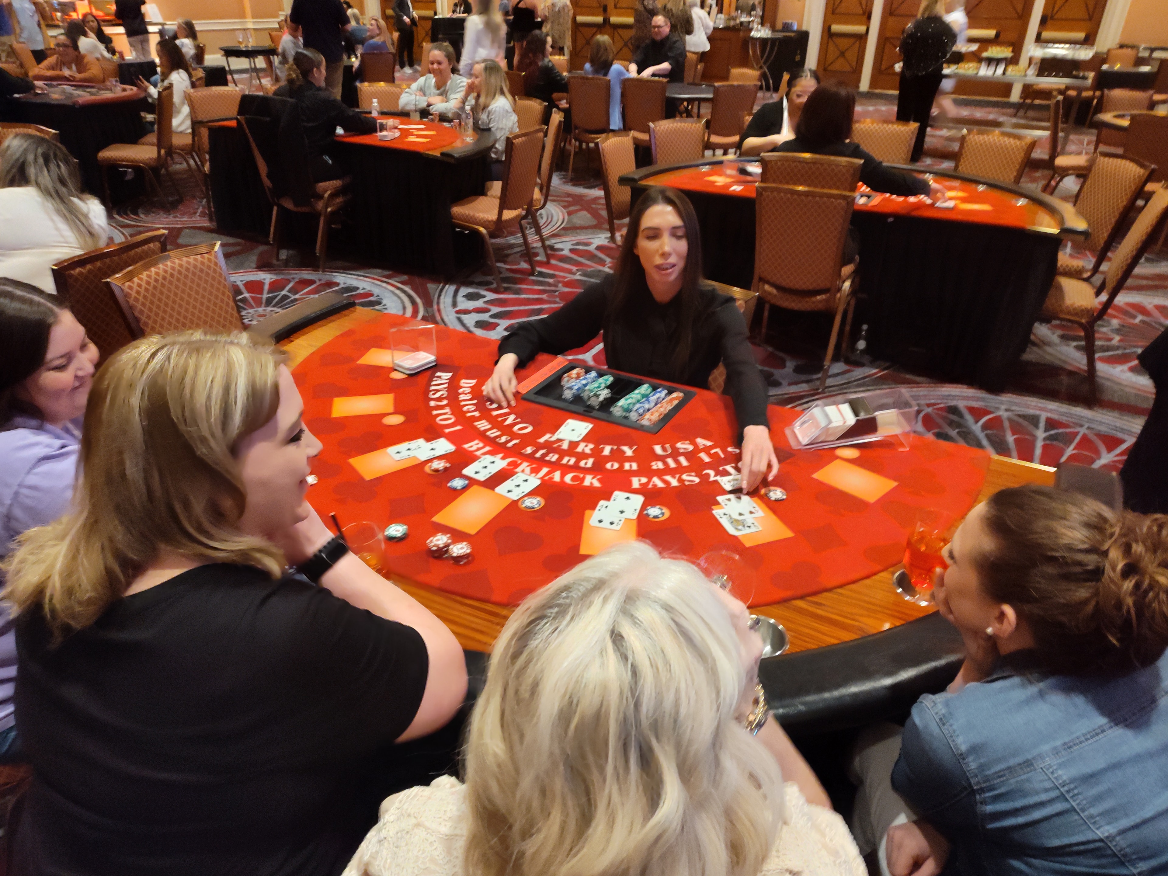 Dealer at a Casino Party USA branded blackjack table in an elegant ballroom in Billings