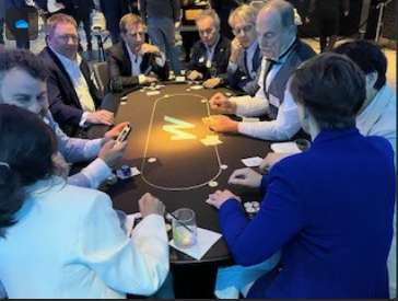 Guests playing poker at a Dallas Casino Party USA event
