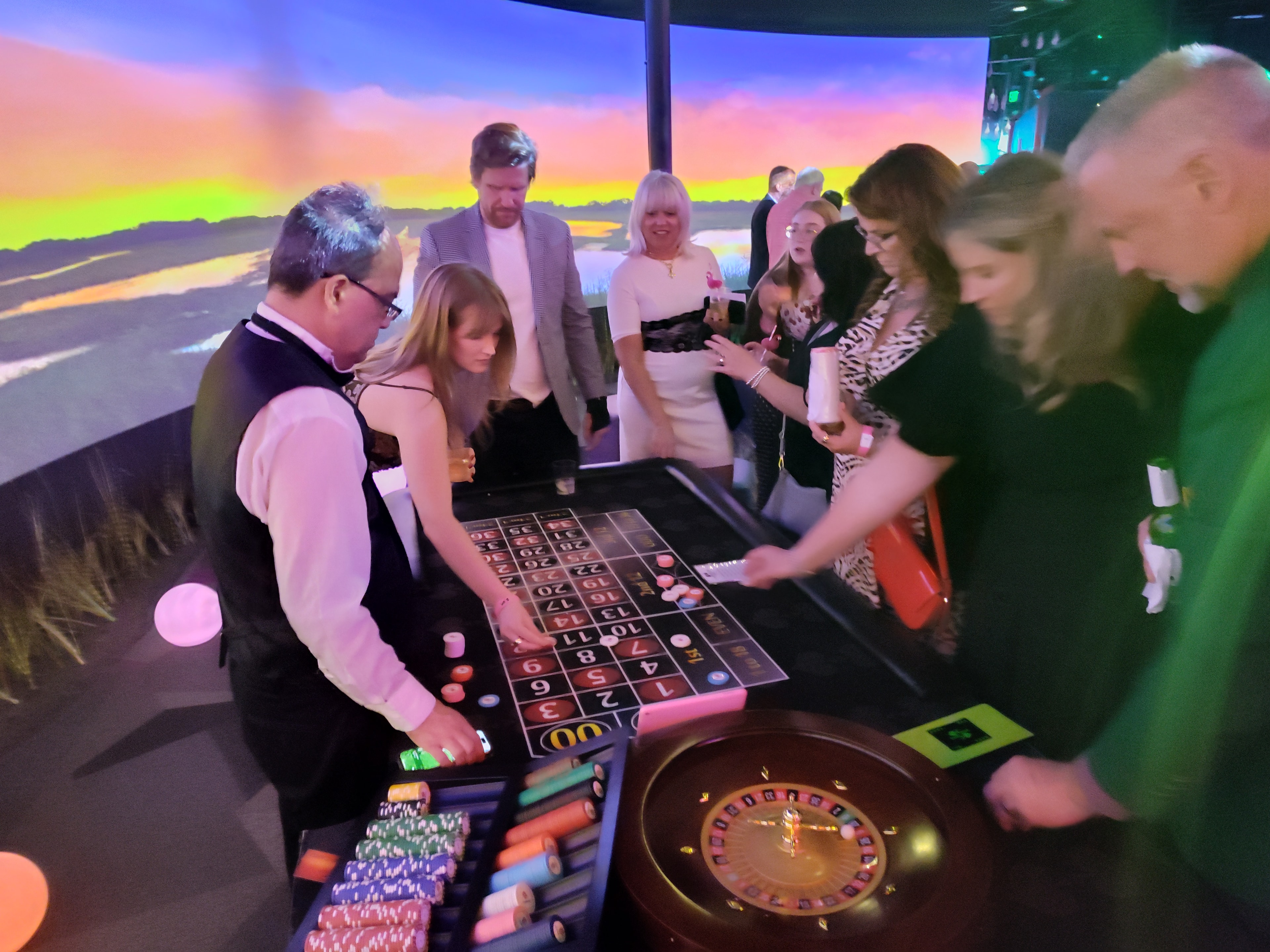Wide shot of a full casino event floor at a Denver Casino Party USA event