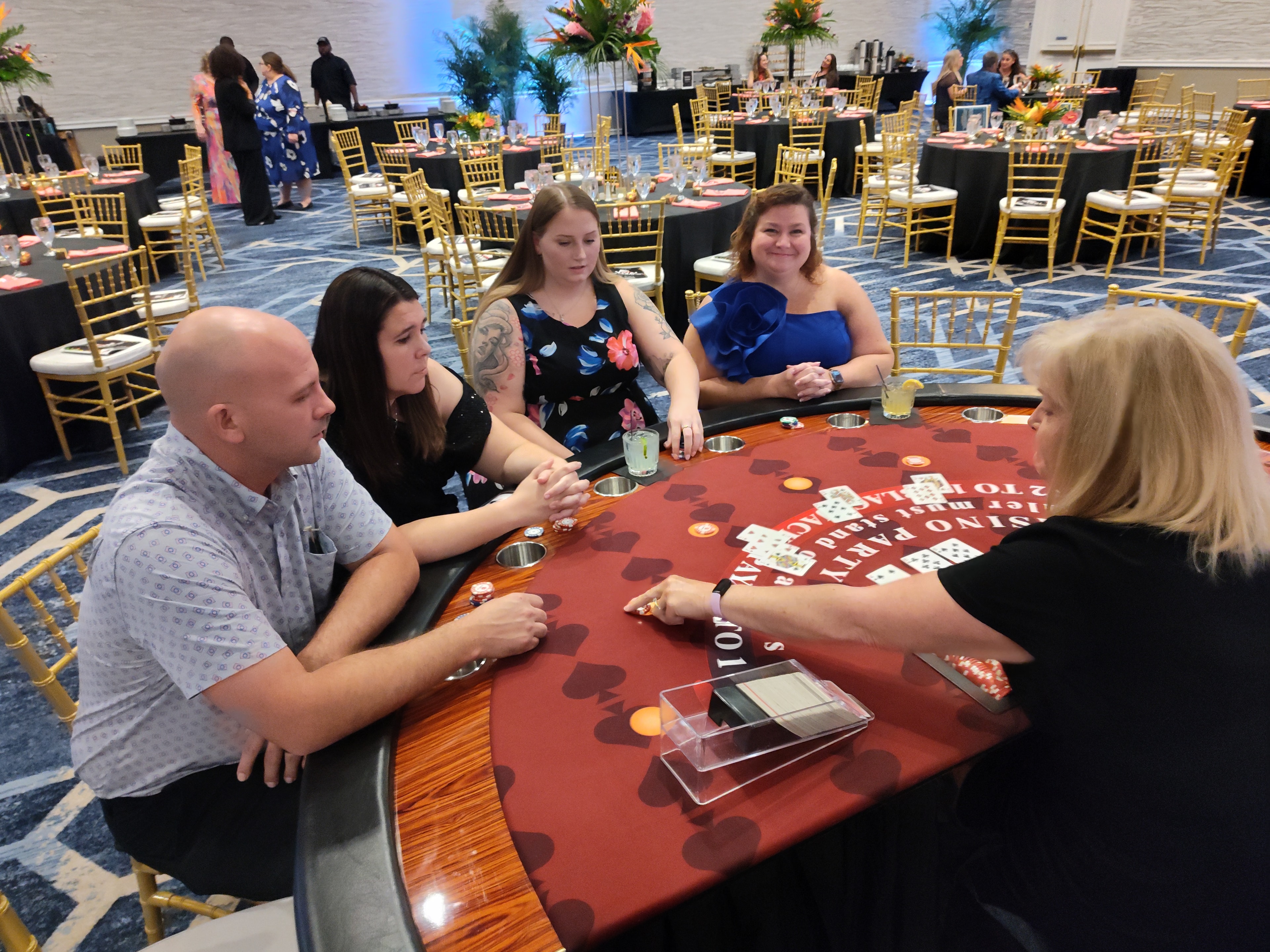 Guests enjoying casino games at a Denver Casino Party USA corporate event