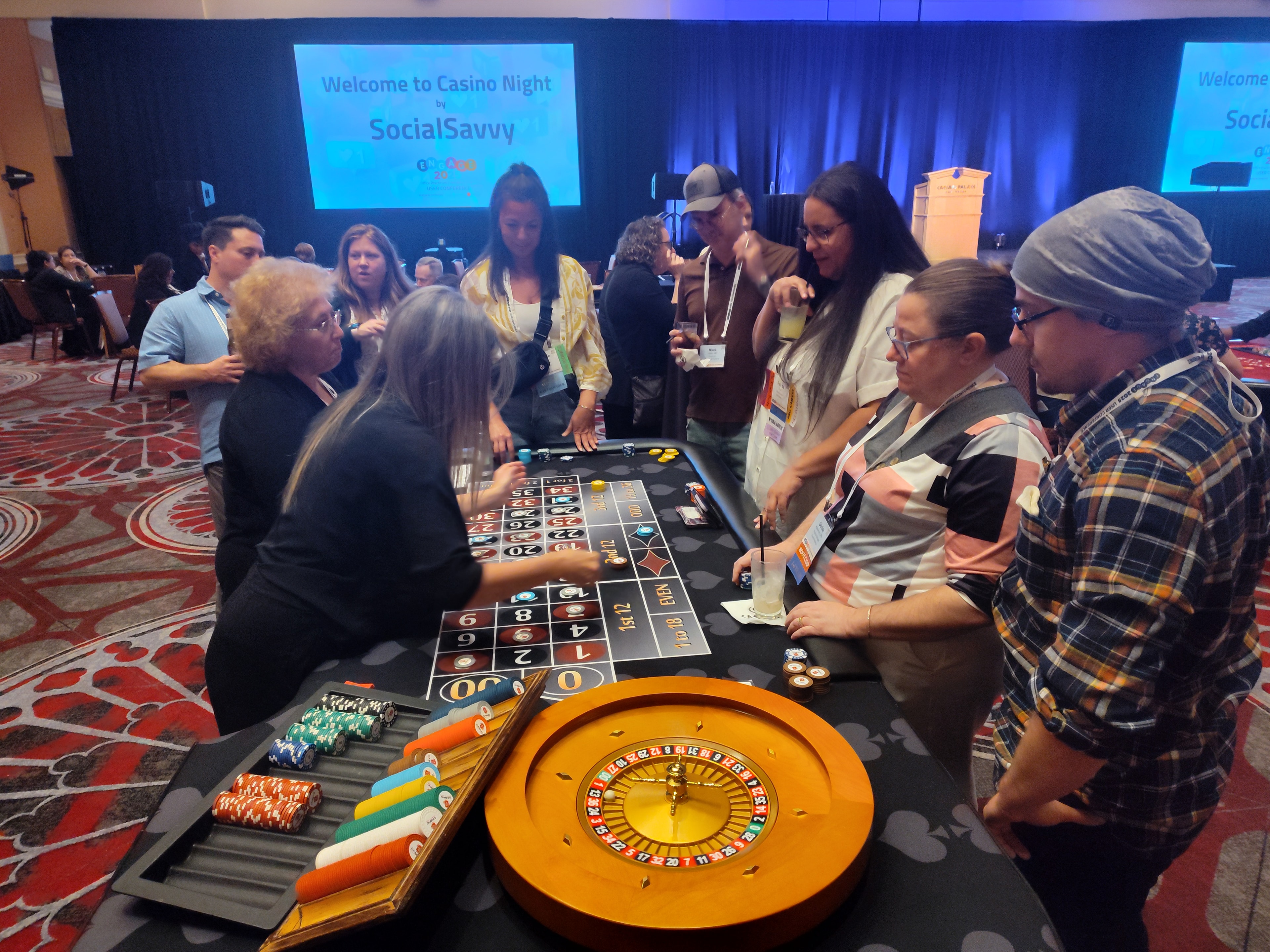 SocialSavvy Casino Night fundraiser with roulette table and guests