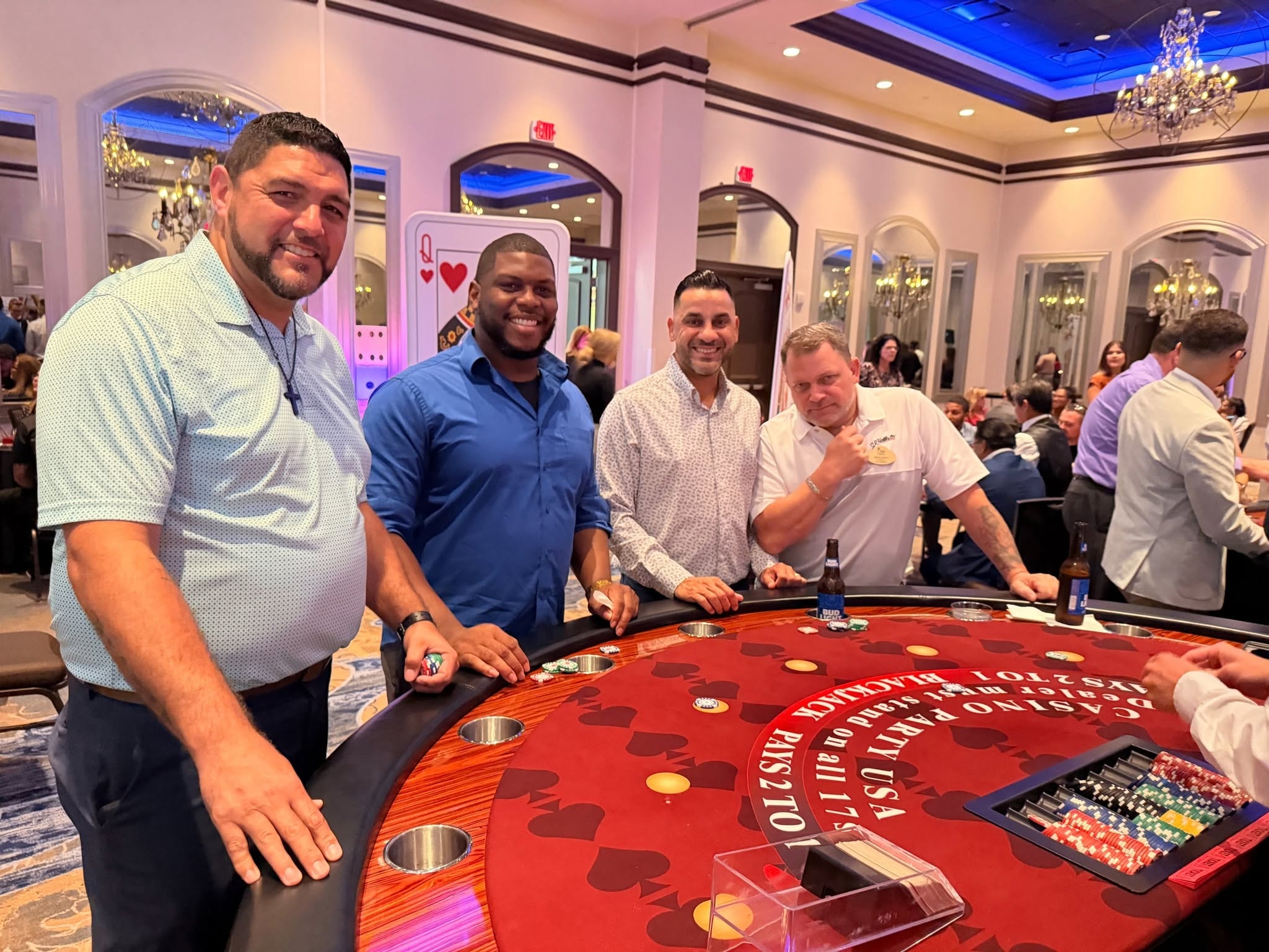 Guests at Casino Party USA blackjack table at a casino event