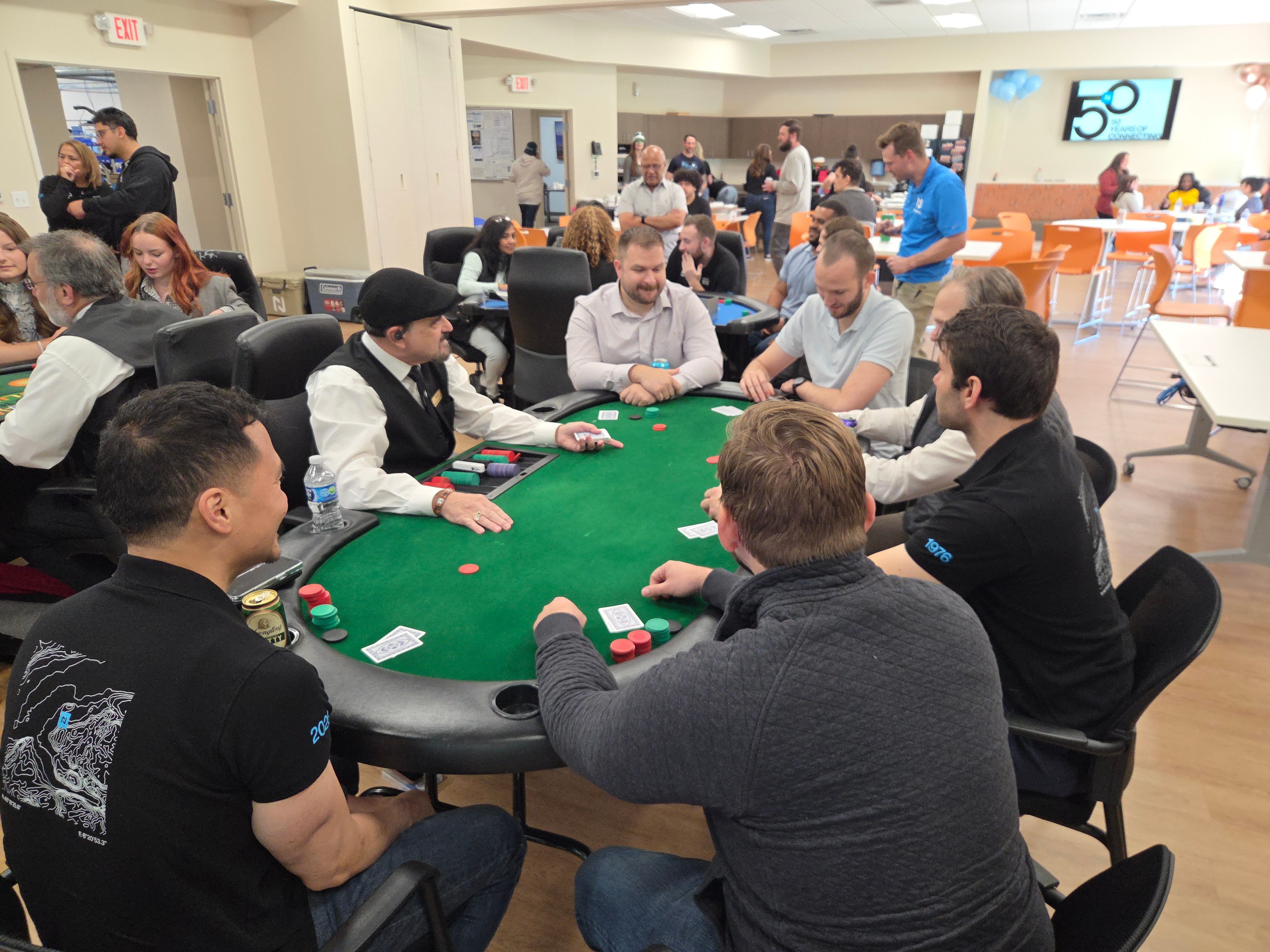 Dealer running a poker table at a Casino Party USA Philadelphia corporate event