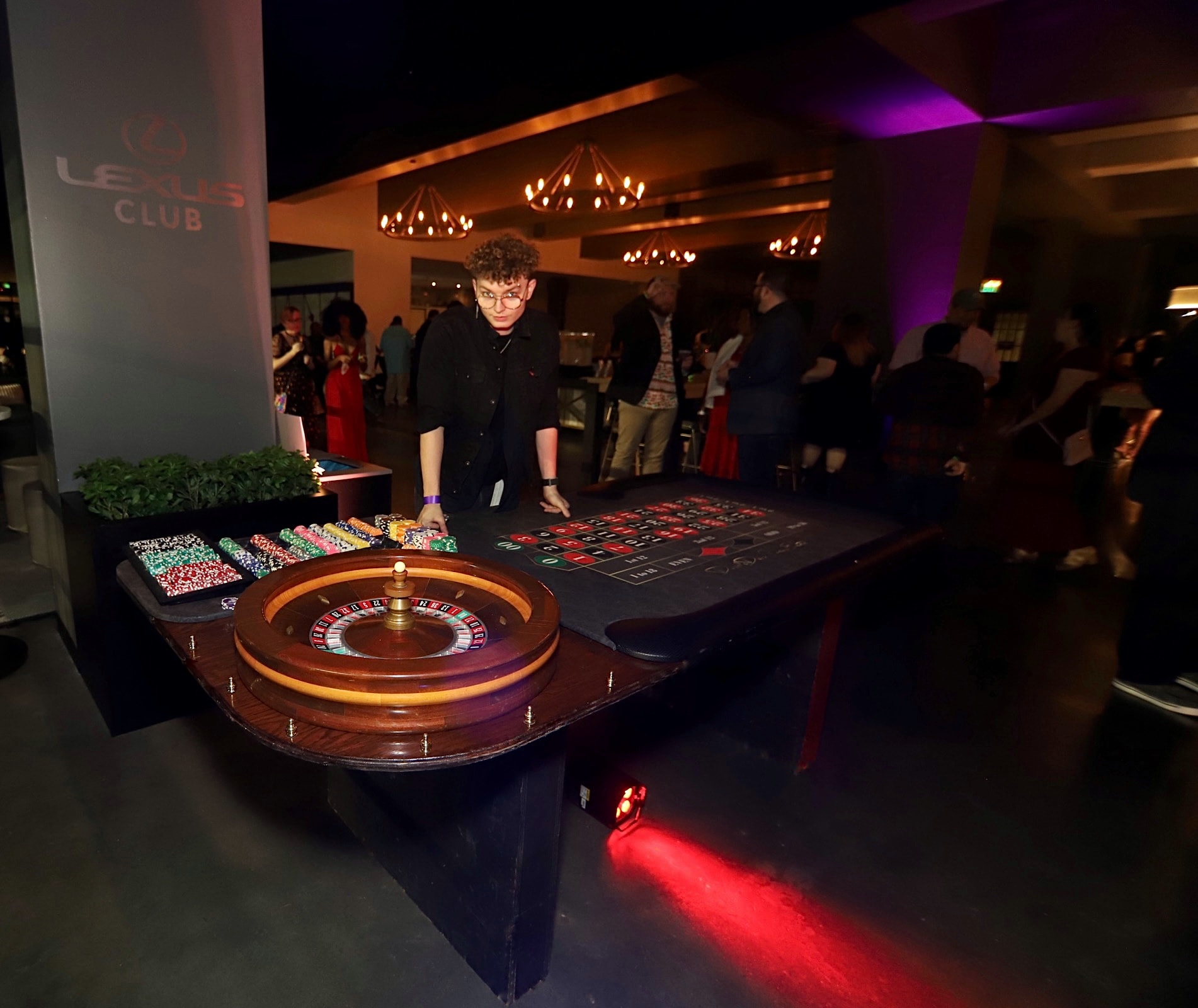 Roulette table dealer at the Lexus Club during a San Antonio Casino Party USA event