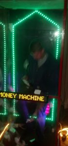 Cash cube rental with swirling bills — Casino Party USA
