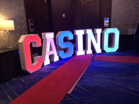Illuminated CASINO neon sign for casino theme party